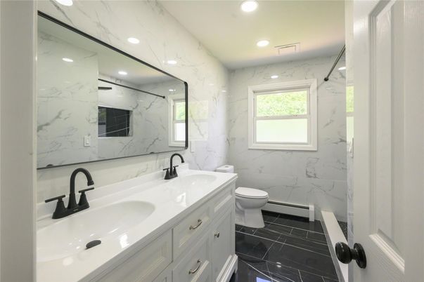 Bathroom, Dual Sink Vanities, Interior, Marble, Marble Walls, Recessed Lighting