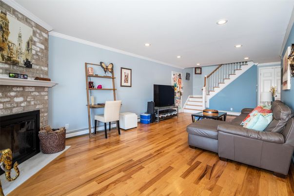 Fireplace, Interior, Living room, Recessed Lighting, Wood Texture Flooring