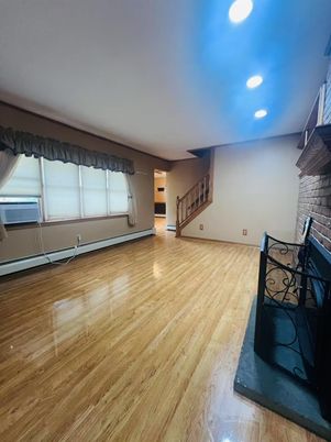 Empty room, Fireplace, Interior, Recessed Lighting, Wood Texture Flooring