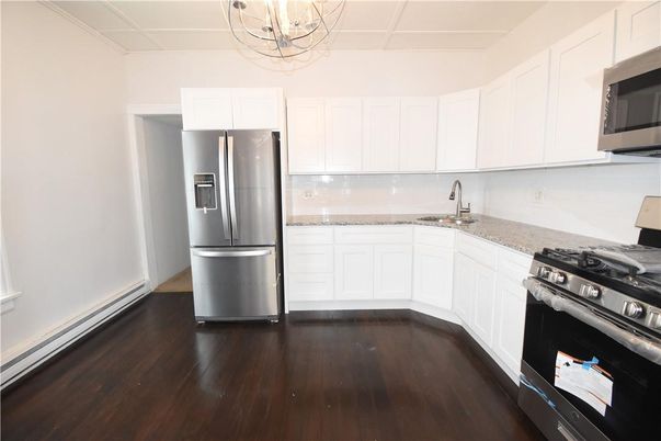 Chandelier, Interior, Kitchen, Stainless Steel Appliances, Wood Texture Flooring