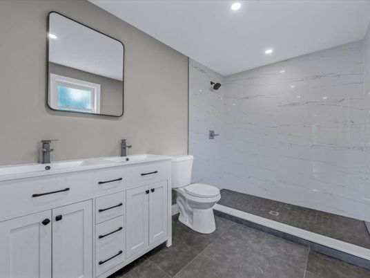 Bathroom, Dual Sink Vanities, Interior, Marble Walls, Recessed Lighting