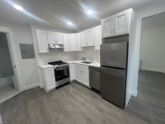 Interior, Kitchen, Recessed Lighting, Stainless Steel Appliances, Wood Texture Flooring