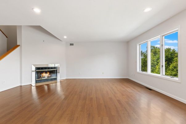 Empty room, Fireplace, Interior, Recessed Lighting, Wood Texture Flooring