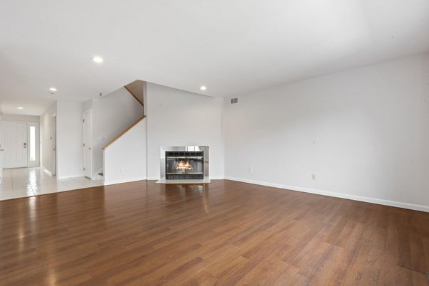Empty room, Fireplace, Interior, Recessed Lighting, Wood Texture Flooring