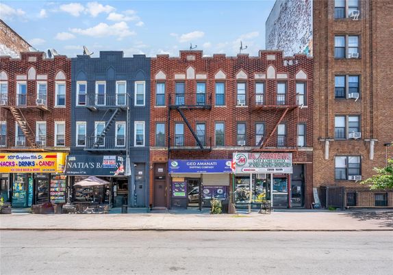 Exterior, Facade, Brick Facade, Condo Building