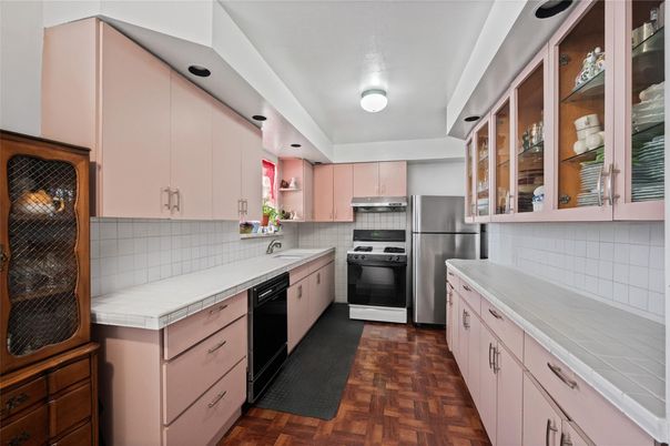 Interior, Kitchen, Stainless Steel Appliances, Tile Countertops, Wood Texture Flooring