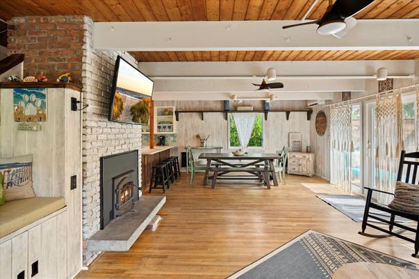 Dining room, Fireplace, Interior, Stone Walls, Wooden Ceilings, Wood Texture Flooring
