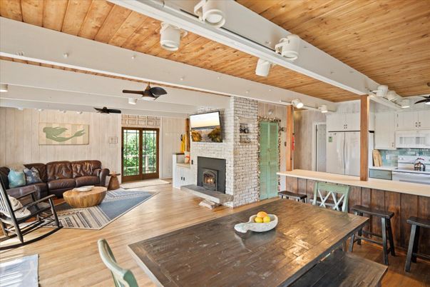 Dining room, Fireplace, Interior, Kitchen, Living room, Stone Walls, Wooden Ceilings, Wood Texture Flooring