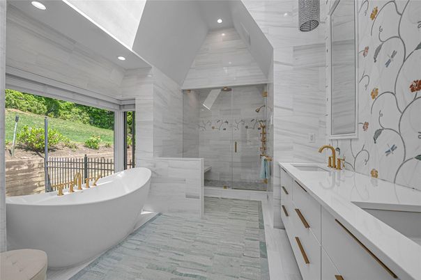 Bathroom, Dual Sink Vanities, Free Standing Baths, Glass Shower, Interior, Marble Walls, Recessed Lighting