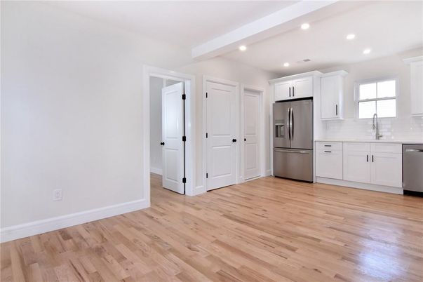 Interior, Kitchen, Recessed Lighting, Stainless Steel Appliances, Wood Texture Flooring