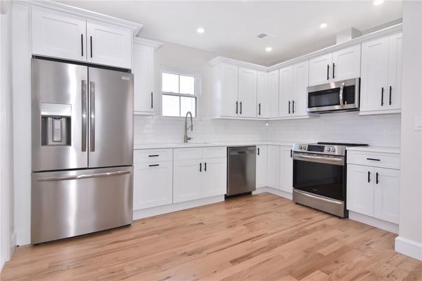Interior, Kitchen, Recessed Lighting, Stainless Steel Appliances, Wood Texture Flooring