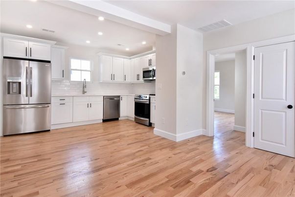 Interior, Kitchen, Recessed Lighting, Stainless Steel Appliances, Wood Texture Flooring