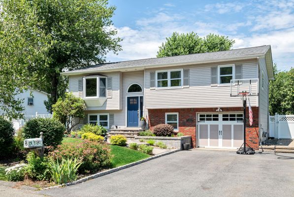 Attached, Exterior, Facade, Brick Facade, Raised Ranch