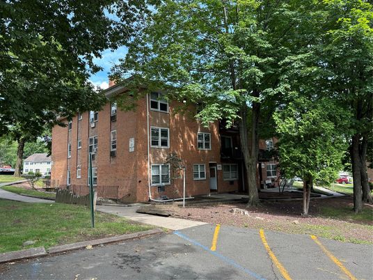 Exterior, Facade, Brick Facade, Condo Building