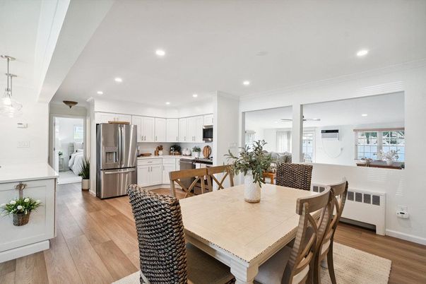 Dining room, Interior, Kitchen, Pendant Lights, Recessed Lighting, Stainless Steel Appliances, Wood Texture Flooring