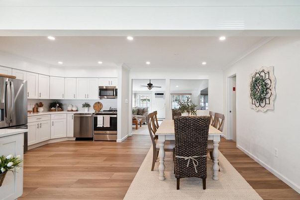 Dining room, Interior, Kitchen, Recessed Lighting, Stainless Steel Appliances, Wood Texture Flooring