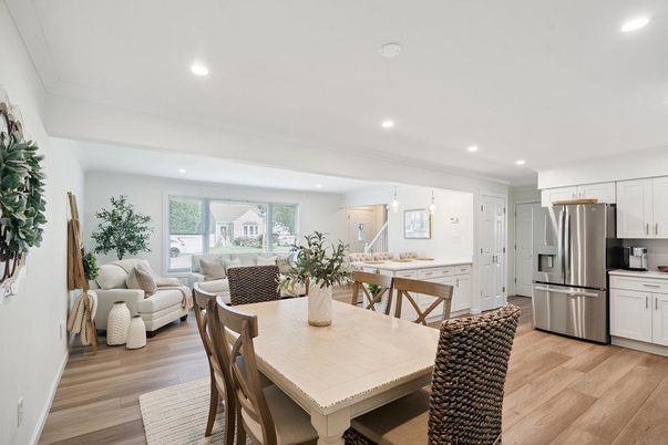 Dining room, Interior, Kitchen, Living room, Recessed Lighting, Stainless Steel Appliances, Wood Texture Flooring