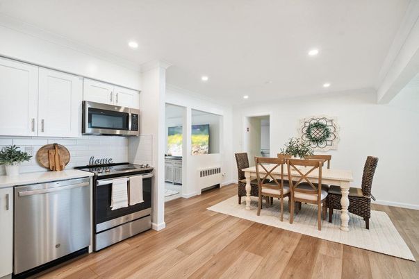 Dining room, Interior, Kitchen, Recessed Lighting, Stainless Steel Appliances, Wood Texture Flooring