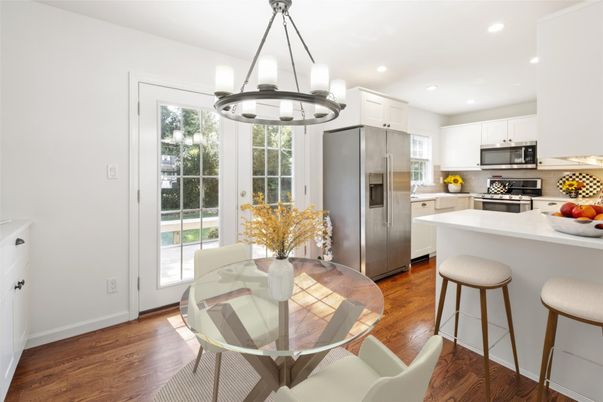 Dining room, Interior, Kitchen, Pendant Lights, Recessed Lighting, Stainless Steel Appliances, Wood Texture Flooring