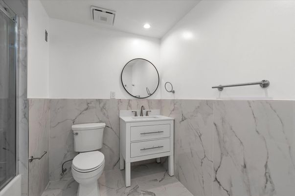 Bathroom, Dual Sink Vanities, Interior, Marble, Marble Walls, Recessed Lighting