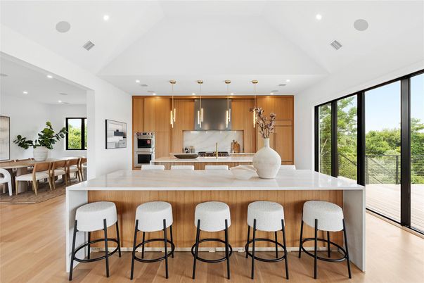 Dining room, Interior, Kitchen, Pendant Lights, Recessed Lighting, Stainless Steel Appliances, Wood Texture Flooring