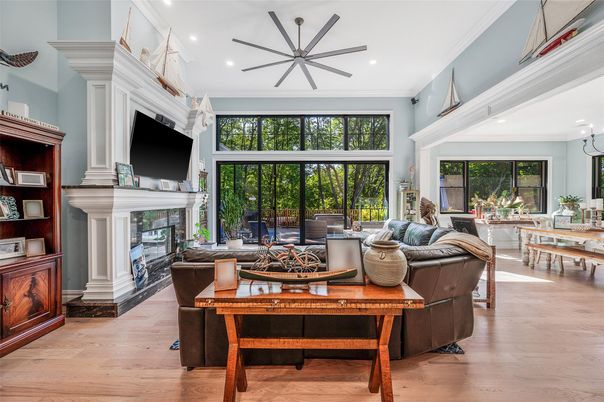 Dining room, Fireplace, Interior, Living room, Pendant Lights, Recessed Lighting, Wood Texture Flooring