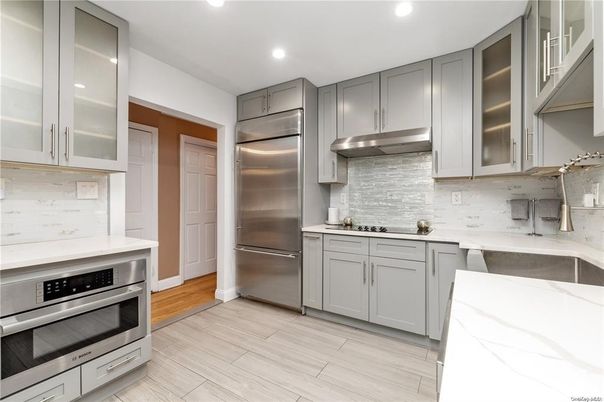 Interior, Kitchen, Recessed Lighting, Stainless Steel Appliances, Wood Texture Flooring