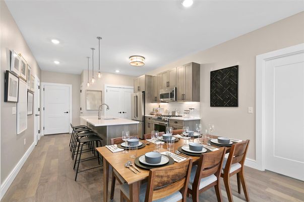 Dining room, Interior, Kitchen, Pendant Lights, Recessed Lighting, Stainless Steel Appliances, Wood Texture Flooring