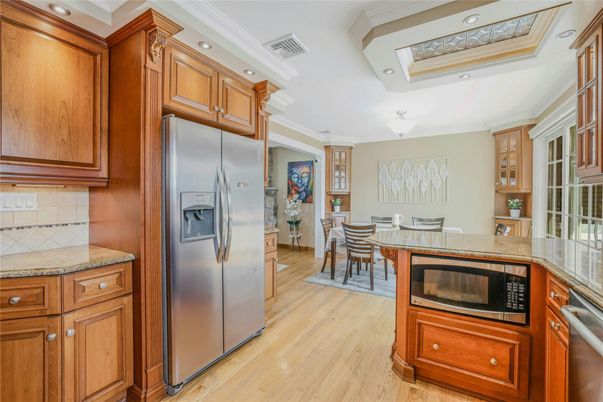 Dining room, Interior, Kitchen, Recessed Lighting, Stainless Steel Appliances, Wood Texture Flooring