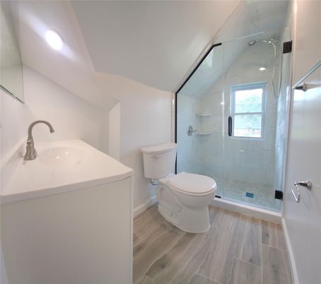 Bathroom, Glass Shower, Interior, Marble Walls, Recessed Lighting, Wood Texture Flooring