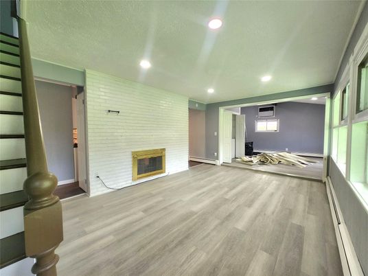 Empty room, Fireplace, Interior, Recessed Lighting, Wood Texture Flooring