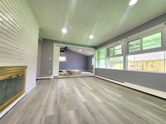 Empty room, Fireplace, Interior, Recessed Lighting, Wood Texture Flooring