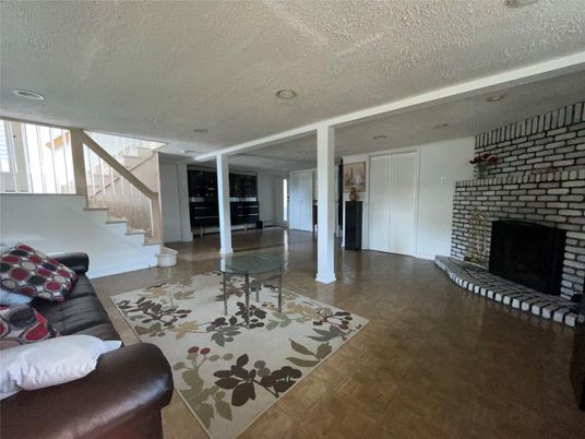 Fireplace, Interior, Recessed Lighting, Stone Walls, Wood Texture Flooring