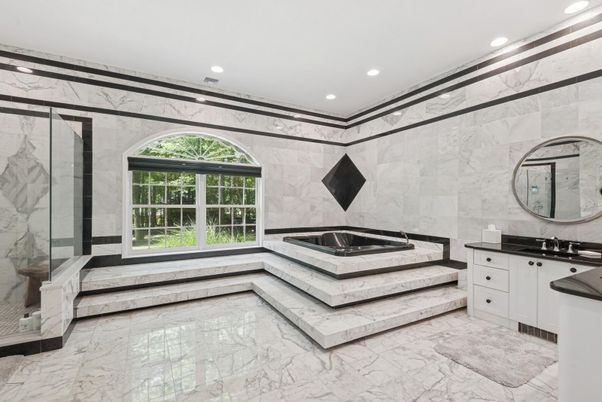 Bathroom, Dual Sink Vanities, Glass Shower, Interior, Marble, Marble Walls, Recessed Lighting