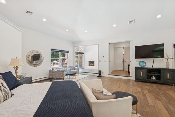 Bedroom, Fireplace, Interior, Recessed Lighting, Wood Texture Flooring