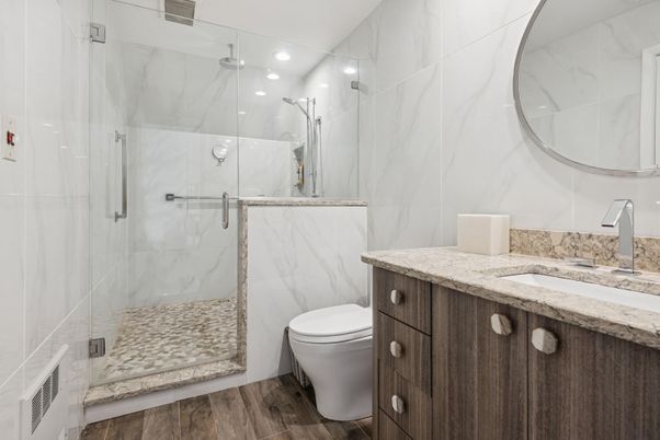Bathroom, Glass Shower, Interior, Marble Walls, Recessed Lighting, Wood Texture Flooring