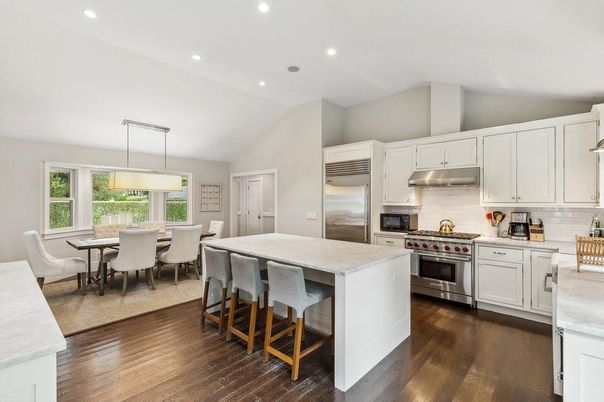 Dining room, Interior, Kitchen, Pendant Lights, Recessed Lighting, Stainless Steel Appliances, Wood Texture Flooring