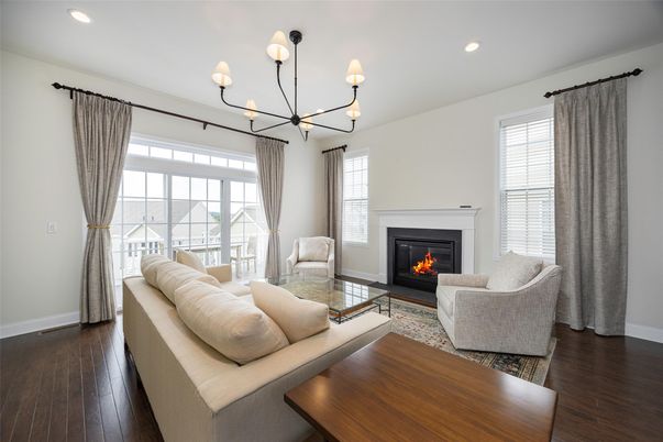 Chandelier, Fireplace, Interior, Living room, Pendant Lights, Recessed Lighting, Wood Texture Flooring