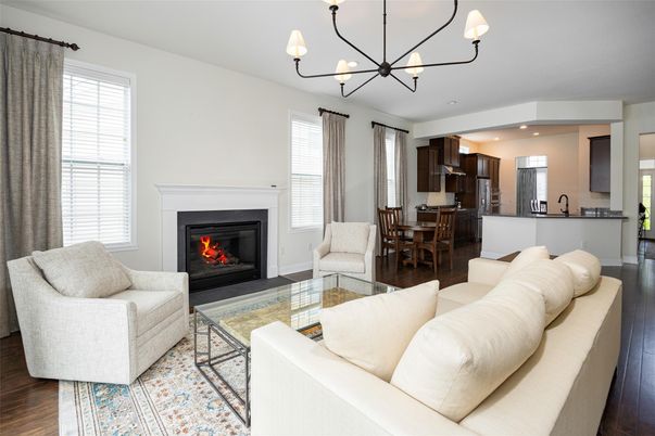 Chandelier, Dining room, Fireplace, Interior, Kitchen, Living room, Recessed Lighting, Wood Texture Flooring