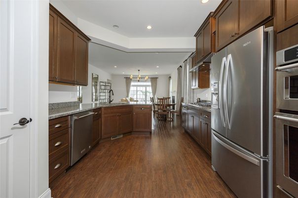 Dining room, Interior, Kitchen, Pendant Lights, Recessed Lighting, Stainless Steel Appliances, Wood Texture Flooring