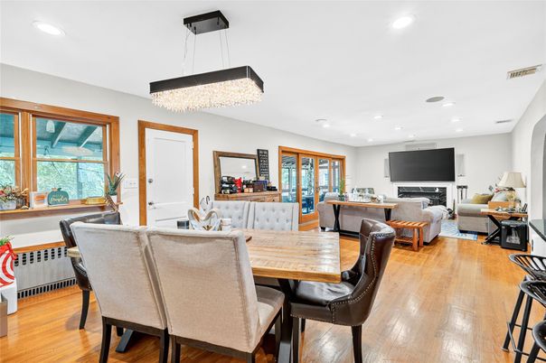 Chandelier, Dining room, Fireplace, Interior, Living room, Recessed Lighting, Wood Texture Flooring