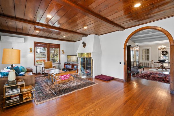 Chandelier, Fireplace, Interior, Living room, Recessed Lighting, Wooden Beams, Wooden Ceilings, Wood Texture Flooring