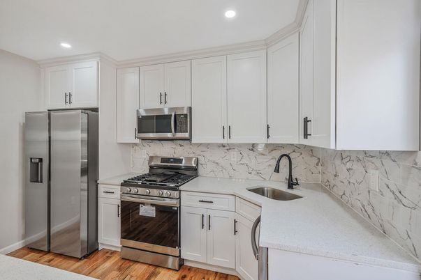 Interior, Kitchen, Recessed Lighting, Stainless Steel Appliances, Wood Texture Flooring