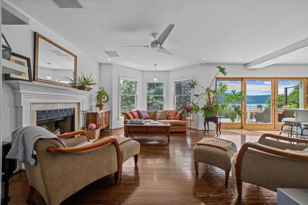 Fireplace, Interior, Living room, Pendant Lights, Recessed Lighting, Water, Wood Texture Flooring