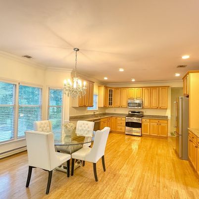 Chandelier, Dining room, Interior, Kitchen, Recessed Lighting, Stainless Steel Appliances, Wood Texture Flooring