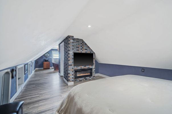 Bedroom, Fireplace, Interior, Recessed Lighting, Wood Texture Flooring