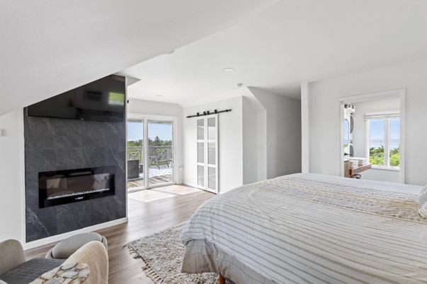 Bedroom, Fireplace, Interior, Recessed Lighting, Wood Texture Flooring