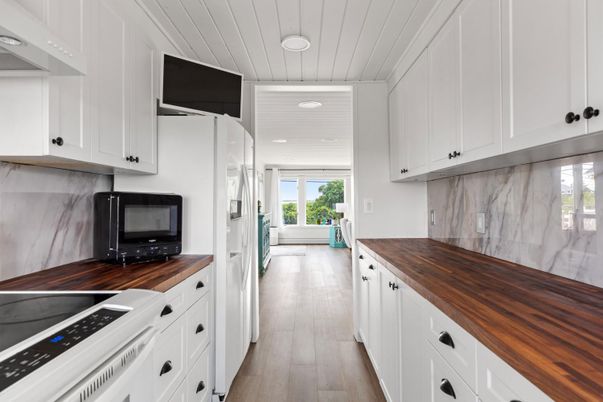 Interior, Kitchen, Marble Walls, Recessed Lighting, Wood Texture Flooring