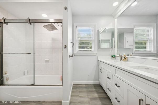 Bathroom, Dual Sink Vanities, Glass Shower, Interior, Recessed Lighting, Wood Texture Flooring