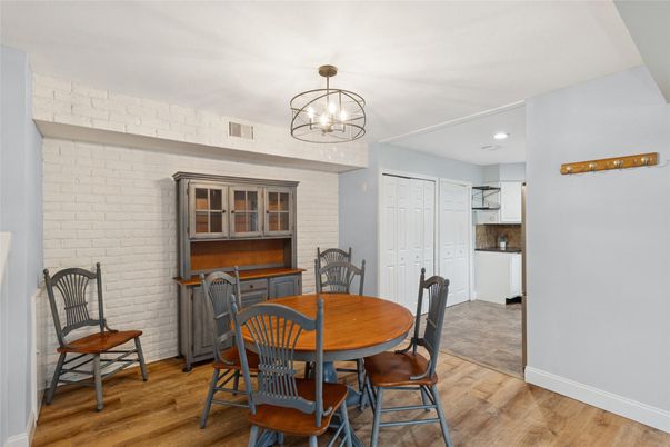 Chandelier, Dining room, Interior, Recessed Lighting, Stone Walls, Wood Texture Flooring